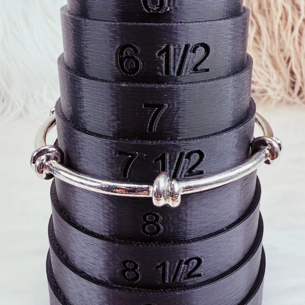 Pretty Silvertone weighted knotted bangle stacking bracelet